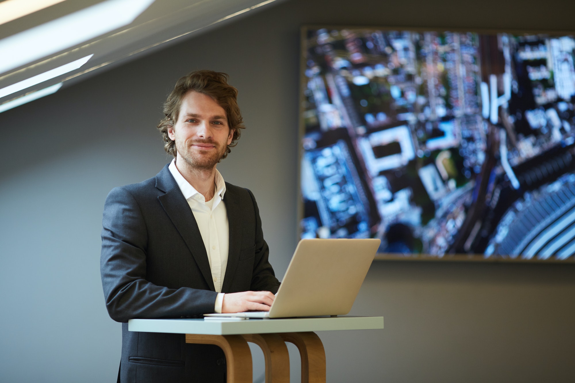 Smiling Manager in Real Estate Agency